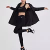 کاپشن بلند مشکی زنانه ژاکت کلاه دار برند Skechers کد 1743730523