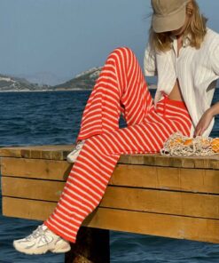 شلوار زنانه کمر گشاد با طرح راه‌راه نارنجی-وانیلی 25S3027 کد 1753696266