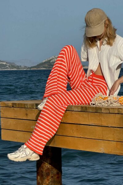 شلوار زنانه کمر گشاد با طرح راه‌راه نارنجی-وانیلی 25S3027 کد 1753696266