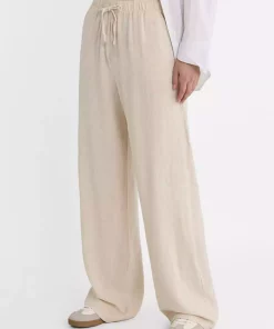 برش کتان گشاد شیری شلوار برند Stradivarius کد 1753351887