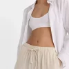 برش کتان گشاد شیری شلوار برند Stradivarius کد 1753351887