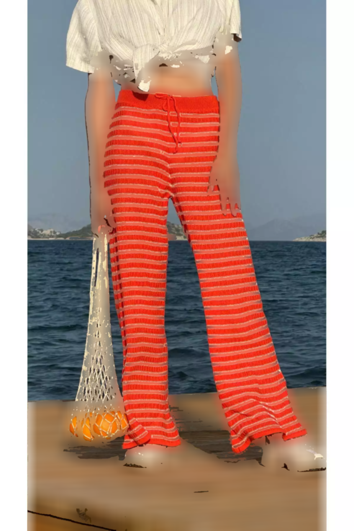 بافتنی طرحدار راهراه پاچه اسپانیایی نارنجی ونیلیا شلوار زنانه برند CHUBA کد 1753696266