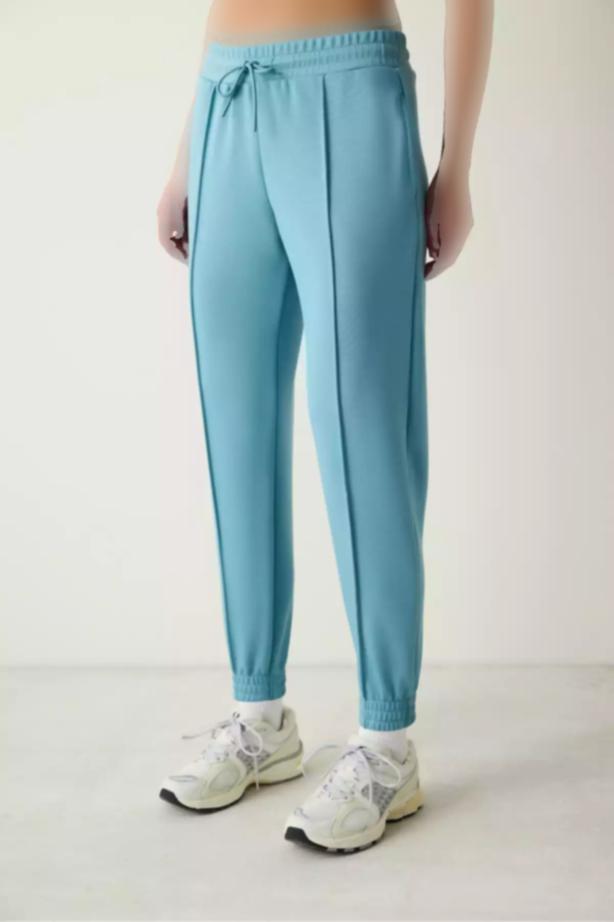 شلوار راحتی جیب دار دور کمر بلند پاچه کشی آبی فیروزه ای برند Penti کد 1757206808