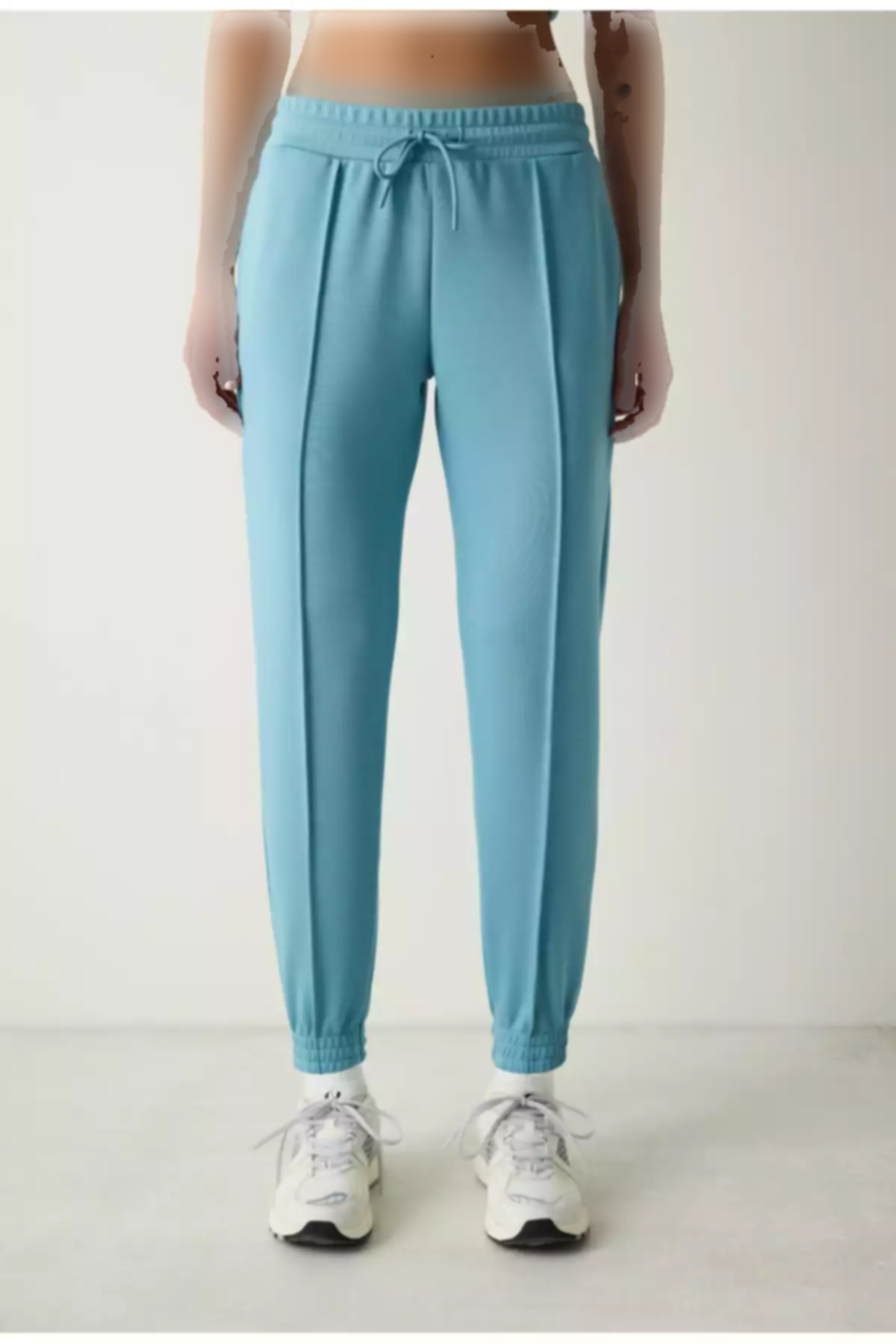 شلوار راحتی جیب دار دور کمر بلند پاچه کشی آبی فیروزه ای برند Penti کد 1757206808