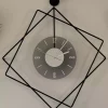 ساعت دیواری شیشه ای فلزی دودی (مبلمان) مشکی برند MetaQuartz Aksesuar کد 1758139924