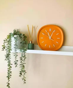 ساعت دیواری باتری دار طرح تزئینی پلی استر مربع نارنجی رنگی ریخته 26cm برند Genel Markalar کد 1758139933