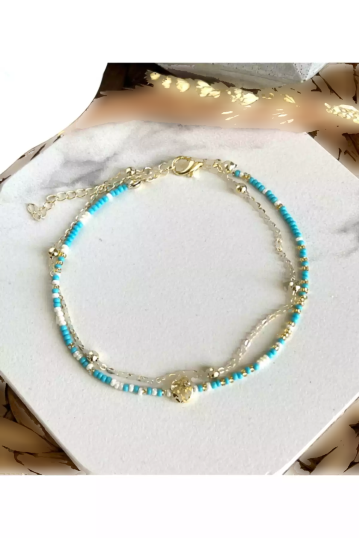 طراحی دوتایی فیروزه ای منجوقدار برند HALHALMILL کد 1757709968