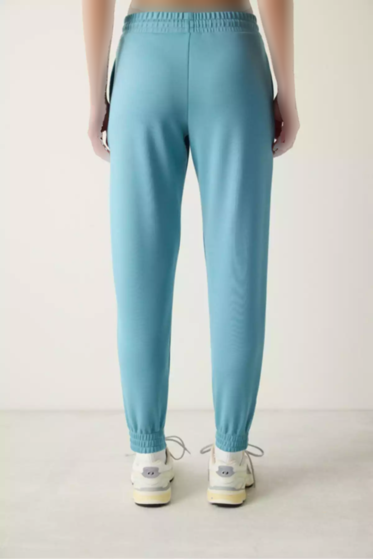 شلوار راحتی جیب دار دور کمر بلند پاچه کشی آبی فیروزه ای برند Penti کد 1757206808