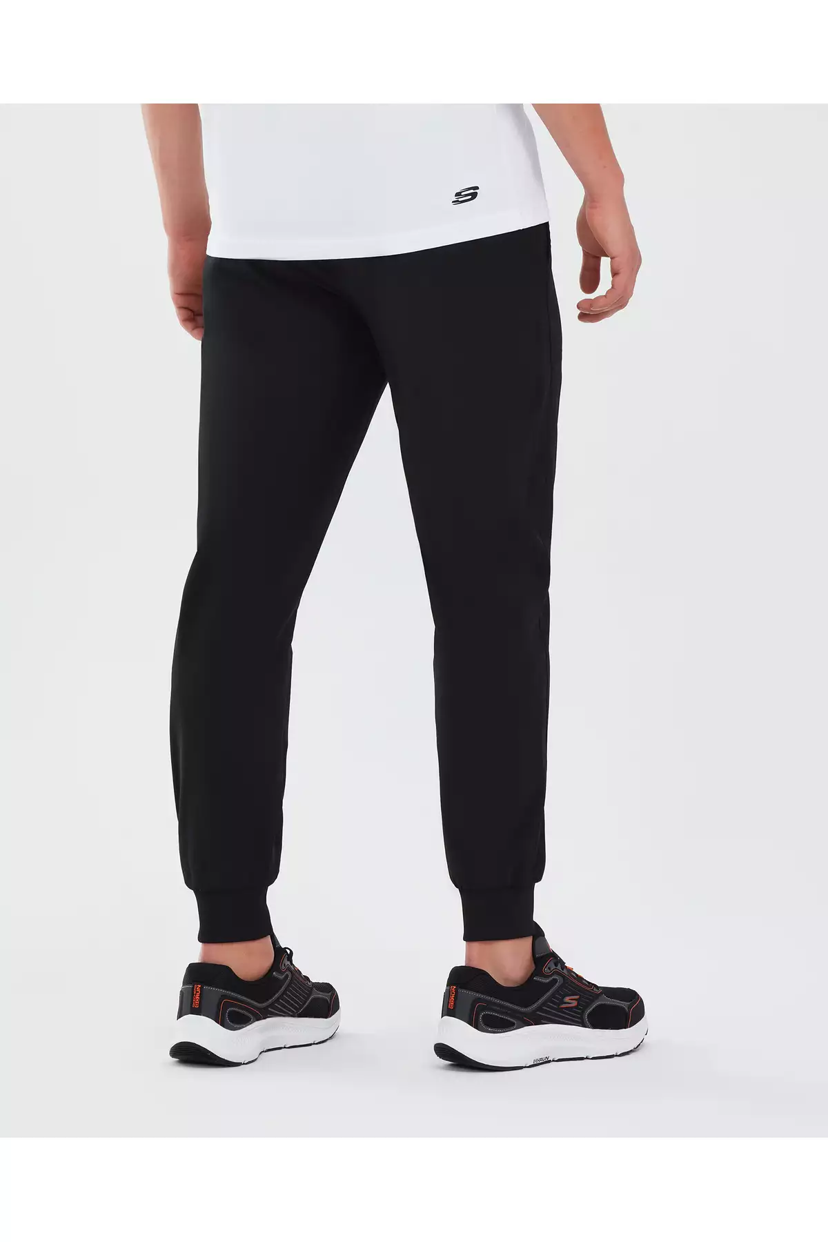 شلوار جوجینگ مردانه مایکرو کالکشن با زیپ کناری - مشکی S211809-001 برند Skechers - 98106288