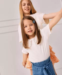 تیشرت کوتاهمورب یقه دکمهای دخترانه با دکمههای تزیینی C3982A524SM برند Defacto - 822806984