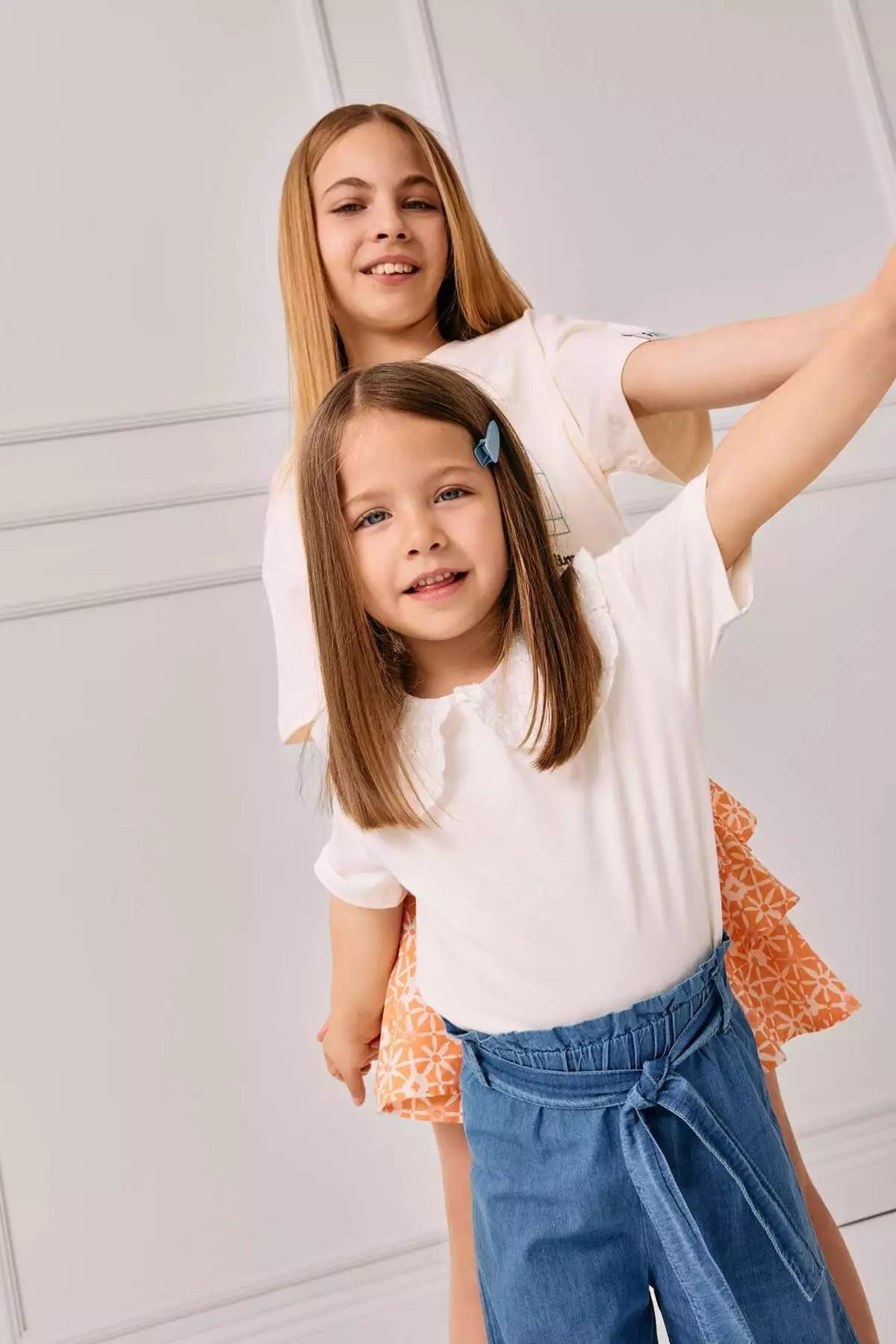 تیشرت کوتاهمورب یقه دکمهای دخترانه با دکمههای تزیینی C3982A524SM برند Defacto - 822806984