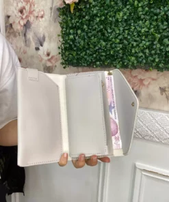 کیف چرمی زنانه با بخش مخصوص تلفن و محفظه برای نقد و سکه و بند مچی برند Baykuş Boutique - 862329641