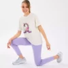 تیشرت گرافیکی برای دختران بزرگ به رنگ سفید خام مدل Sk2510022-102 برند Skechers - 928427632