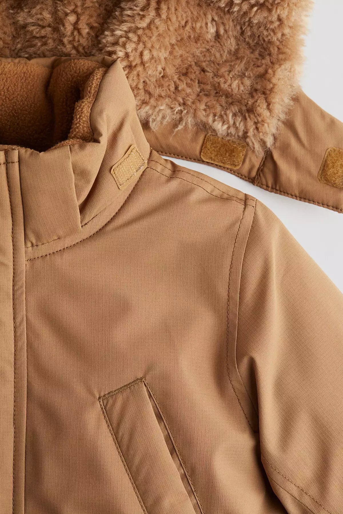 پارکا ضد آب دولگولو برند H&M - 982098504