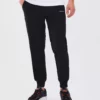 شلوار جوجینگ مردانه مایکرو کالکشن با زیپ کناری - مشکی S211809-001 برند Skechers - 98106288