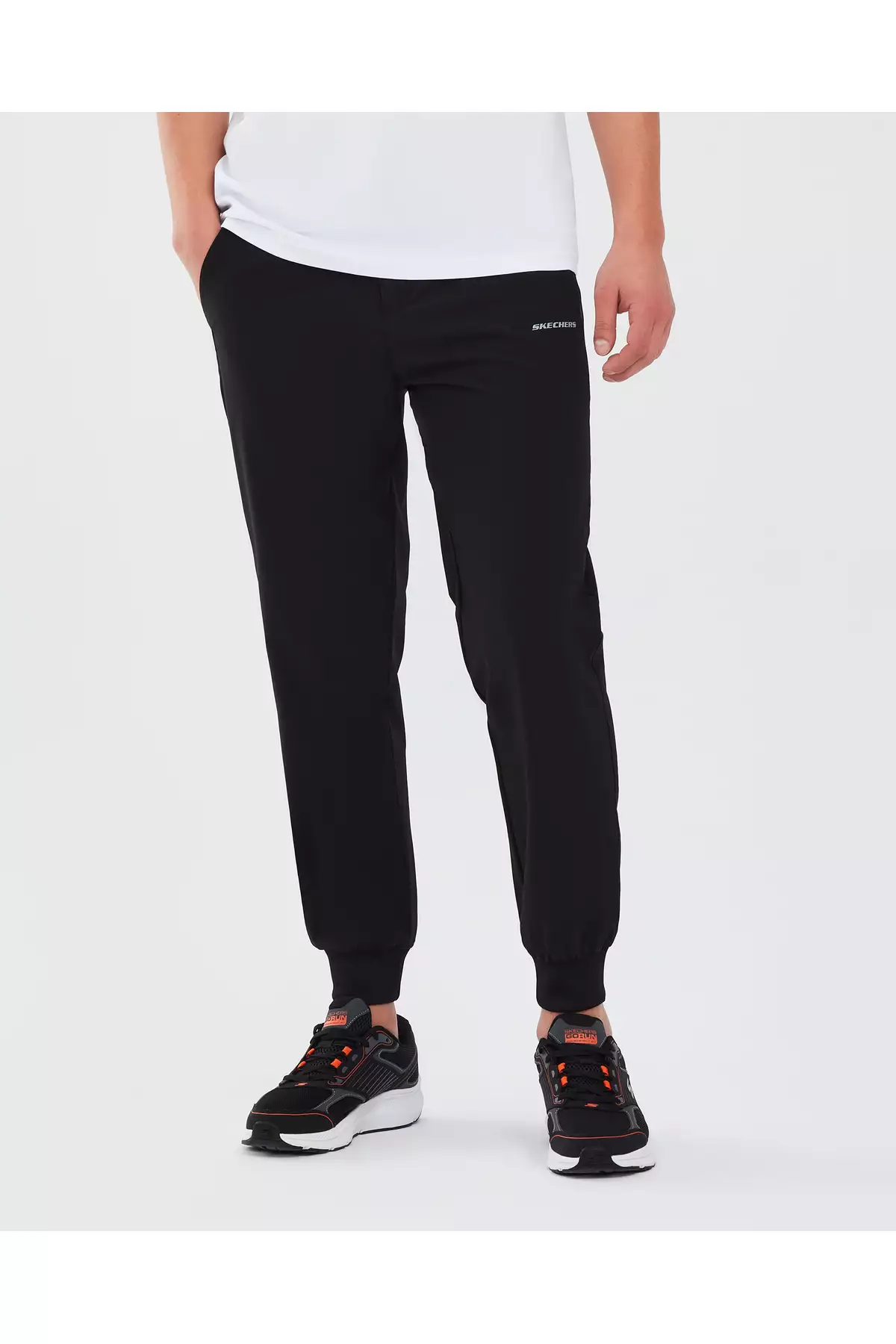 شلوار جوجینگ مردانه مایکرو کالکشن با زیپ کناری - مشکی S211809-001 برند Skechers - 98106288