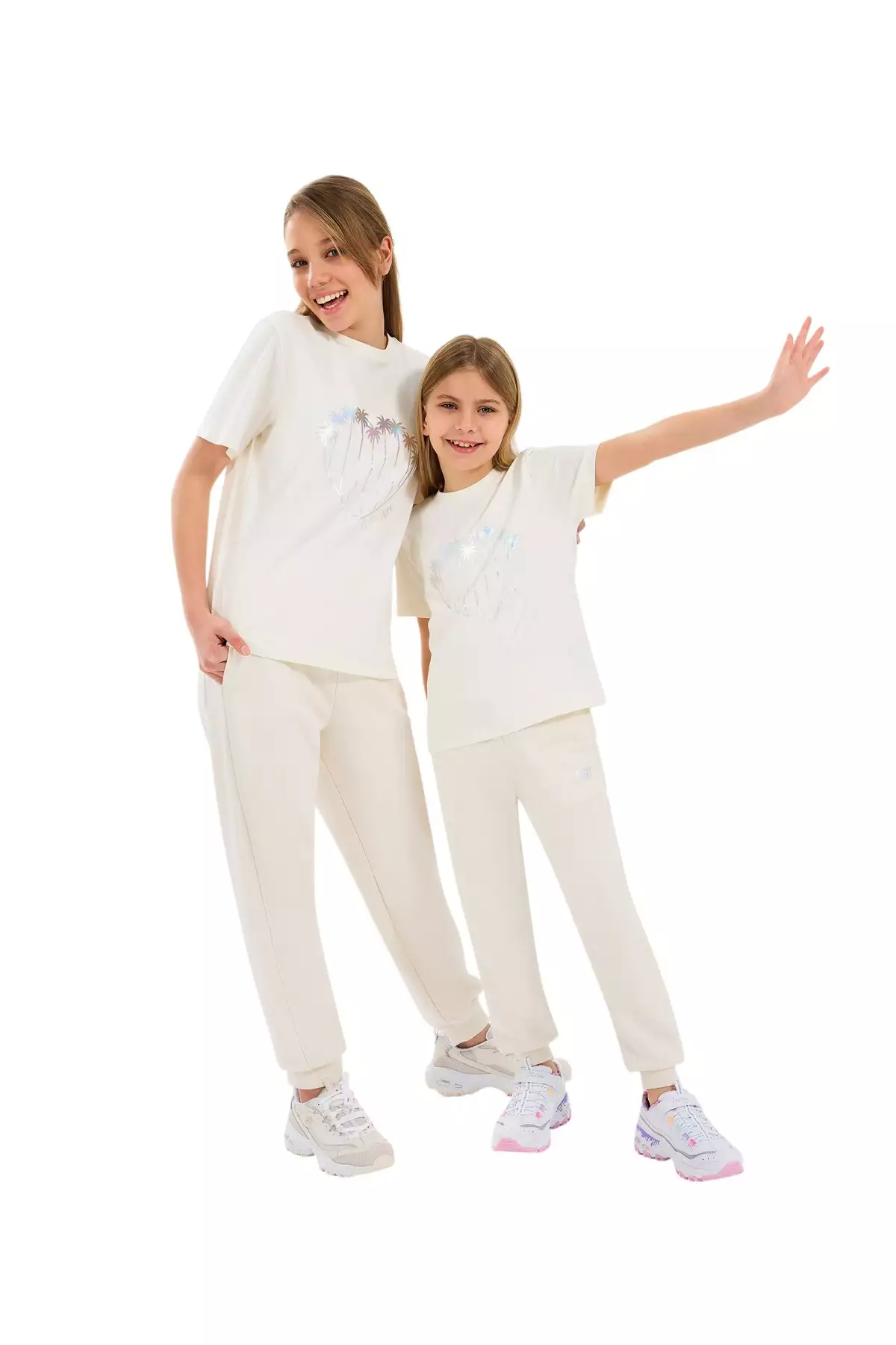 تیشرت گرافیکی بزرگ دخترانه رنگ کرم Off White مدل Sk2510122-102 برند Skechers - 928427859