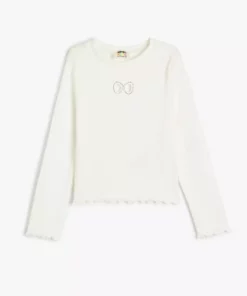 تیشرت فیتیلهای با جزئیات پنجرهای و پاپیون، آستین بلند، یقه گرد و نخی، تزئین شده با سنگهای زینتی. برند Koton - 853423555