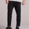 شلوار عرقی مردانه مدل M 2XI-Lock PU با طرح چاپی - رنگ مشکی شماره S231078-001 برند Skechers - 664728997
