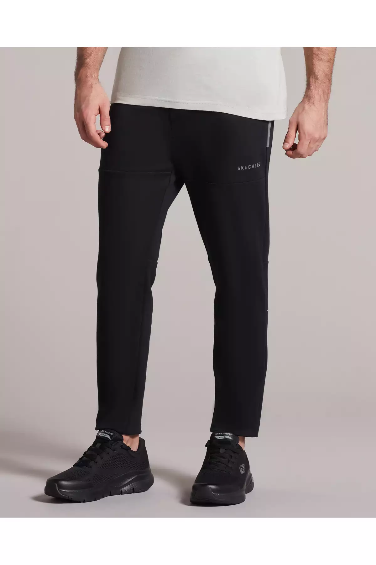 شلوار عرقی مردانه مدل M 2XI-Lock PU با طرح چاپی - رنگ مشکی شماره S231078-001 برند Skechers - 664728997