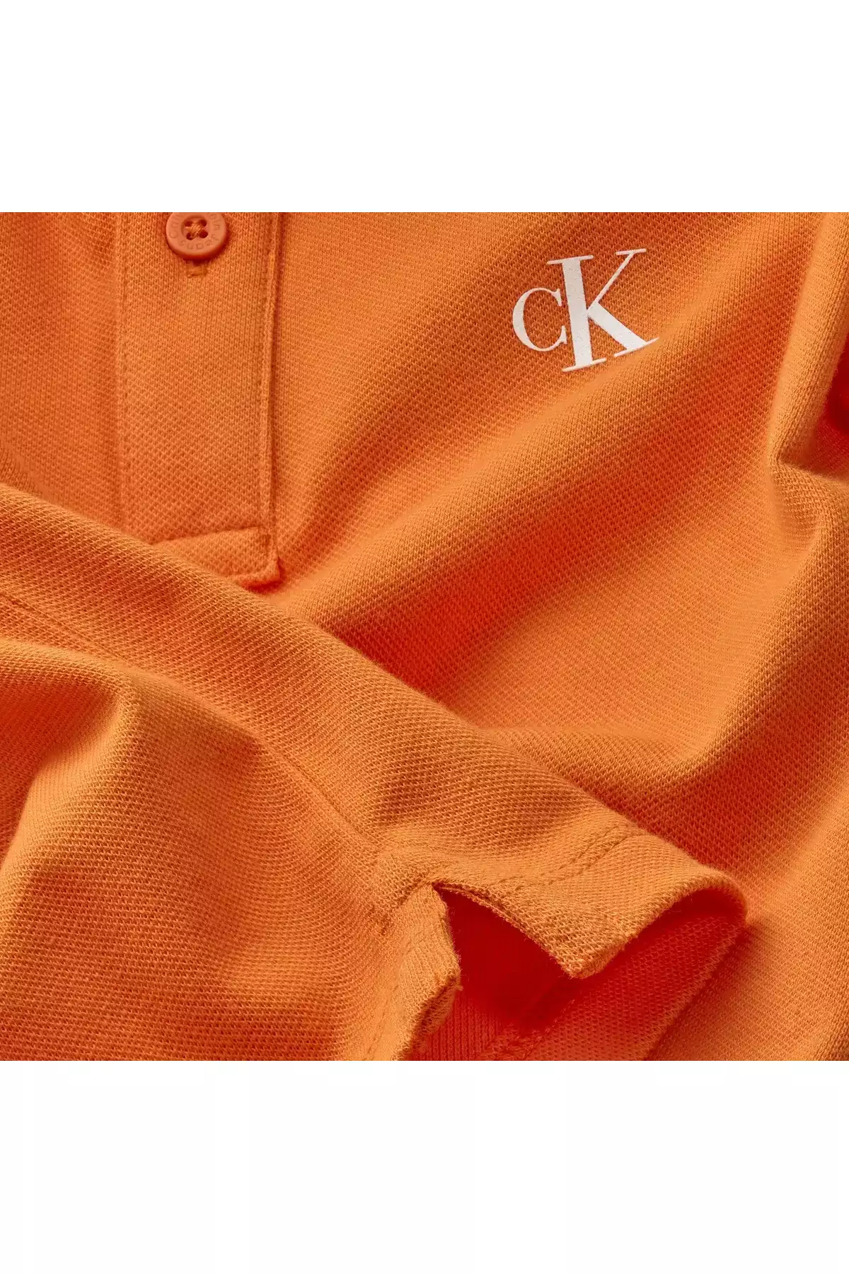 پ polo تی شرت مردانه نارنجی با طرح مونوگرام برند Calvin Klein - 984958595