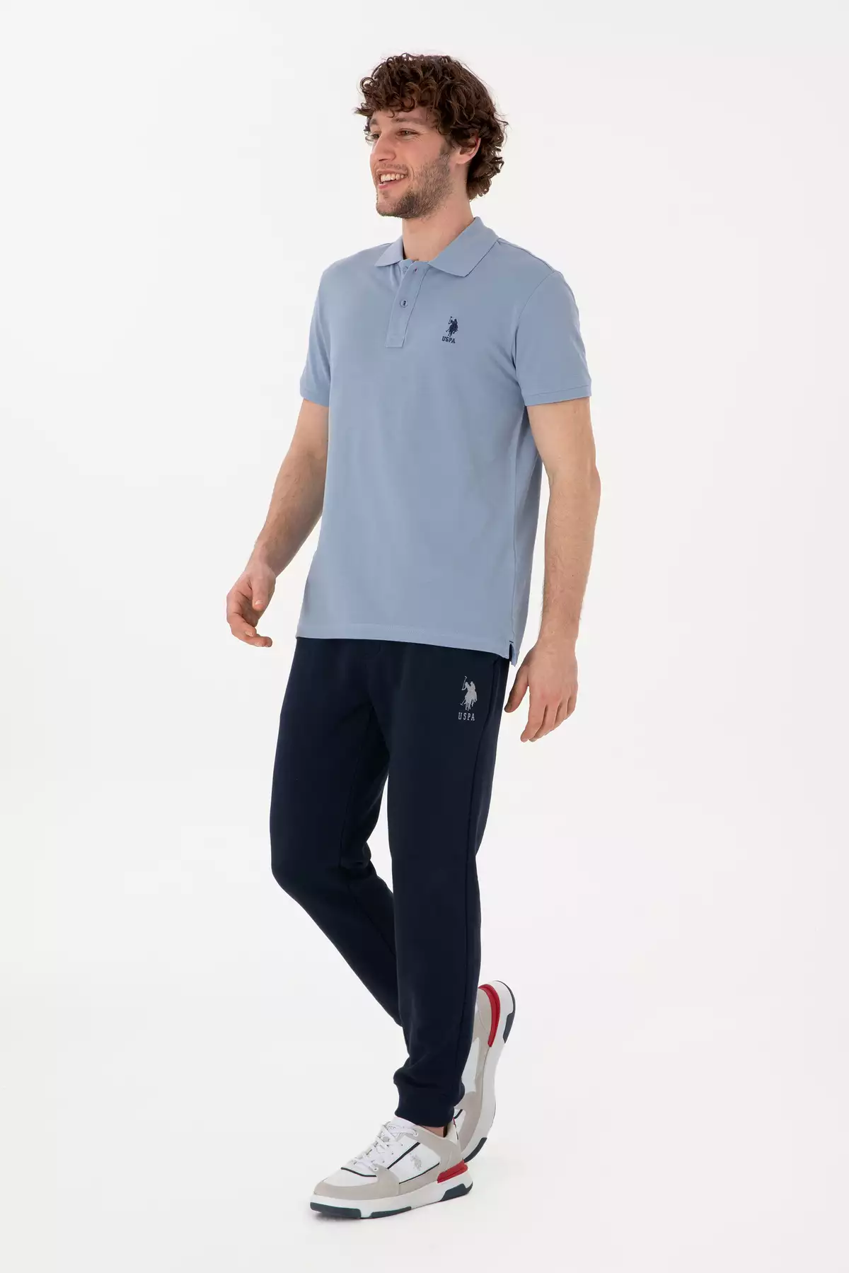 شلوار ورزشی مردانه با فیت اسلیم و دمپا کشباف رنگ سرمهای 50298047-VR033 برند U.S. Polo Assn. - 922054979