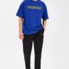 شلوار اسلینم مردانه برند Skechers - 1039123686
