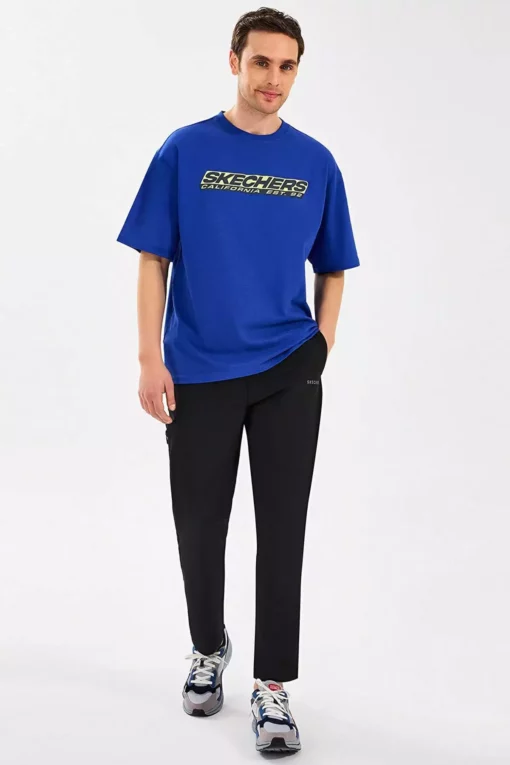شلوار اسلینم مردانه برند Skechers - 1039123686