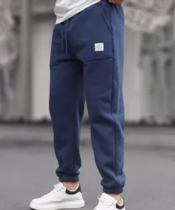 شلوار ورزشی مردانه طرح جیب دار رنگ سرمهای 6522 برند Madmext - 752380295