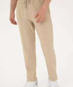 شلوار ورزشی مردانه به رنگ خاکی روشن ۵۰۲۸۹۲۸۶-VR183 برند U.S. Polo Assn. - 833113240