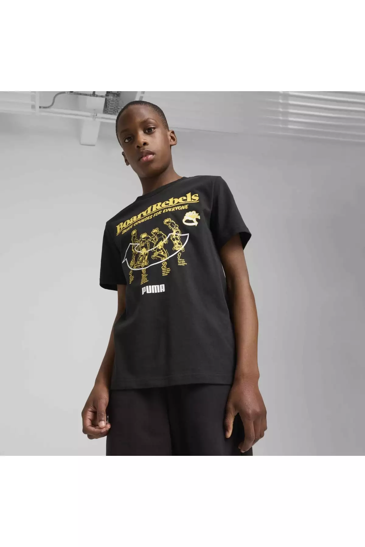 تیشرت گرد یقه مشکی با طرح گرافیکی دهه ۹۰ میلادی برای کودکان برند Puma - 903887806