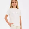 تیشرت گرافیکی بزرگ دخترانه رنگ کرم Off White مدل Sk2510122-102 برند Skechers - 928427859