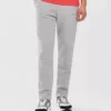 شلوار ورزش مردانه مدل Essential M Slim رنگ خاکستری کد S232237-036 برند Skechers - 813379022