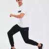 شلوار جوجینگ مردانه مایکرو کالکشن با زیپ کناری - مشکی S211809-001 برند Skechers - 98106288
