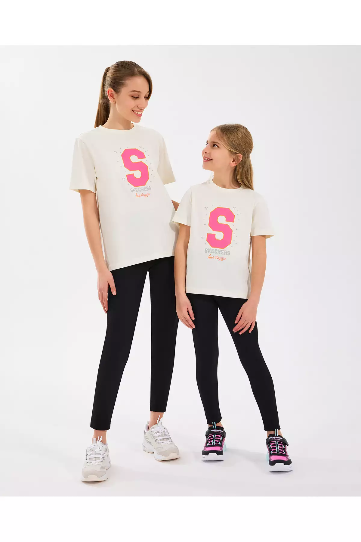 تیشرت گرافیکی بزرگ دخترانه رنگ سفید مدل SK2510016-102 برند Skechers - 928427653