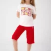 ست کمرنگ و کوتاه دخترانه با طرح برگهای رنگارنگ برند U.S. Polo Assn. - 649438329
