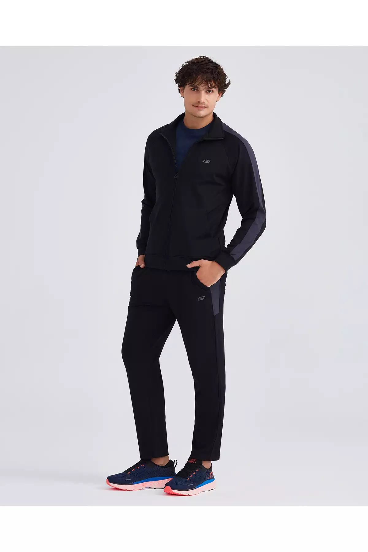 مجموعه میکرو مایرا لباس ورزشیEssential برای آقایان - رنگ سیاه مدل S212165-001 برند Skechers - 205296604