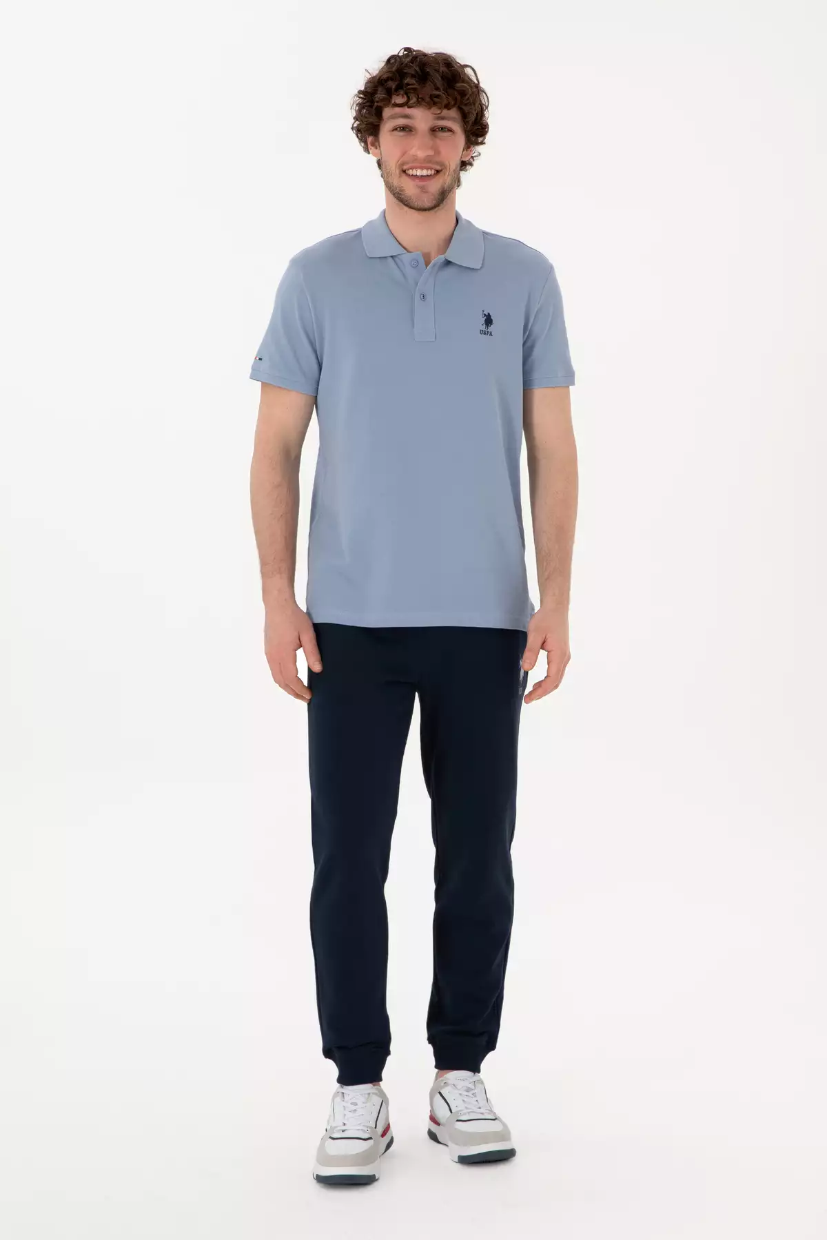 شلوار ورزشی مردانه با فیت اسلیم و دمپا کشباف رنگ سرمهای 50298047-VR033 برند U.S. Polo Assn. - 922054979