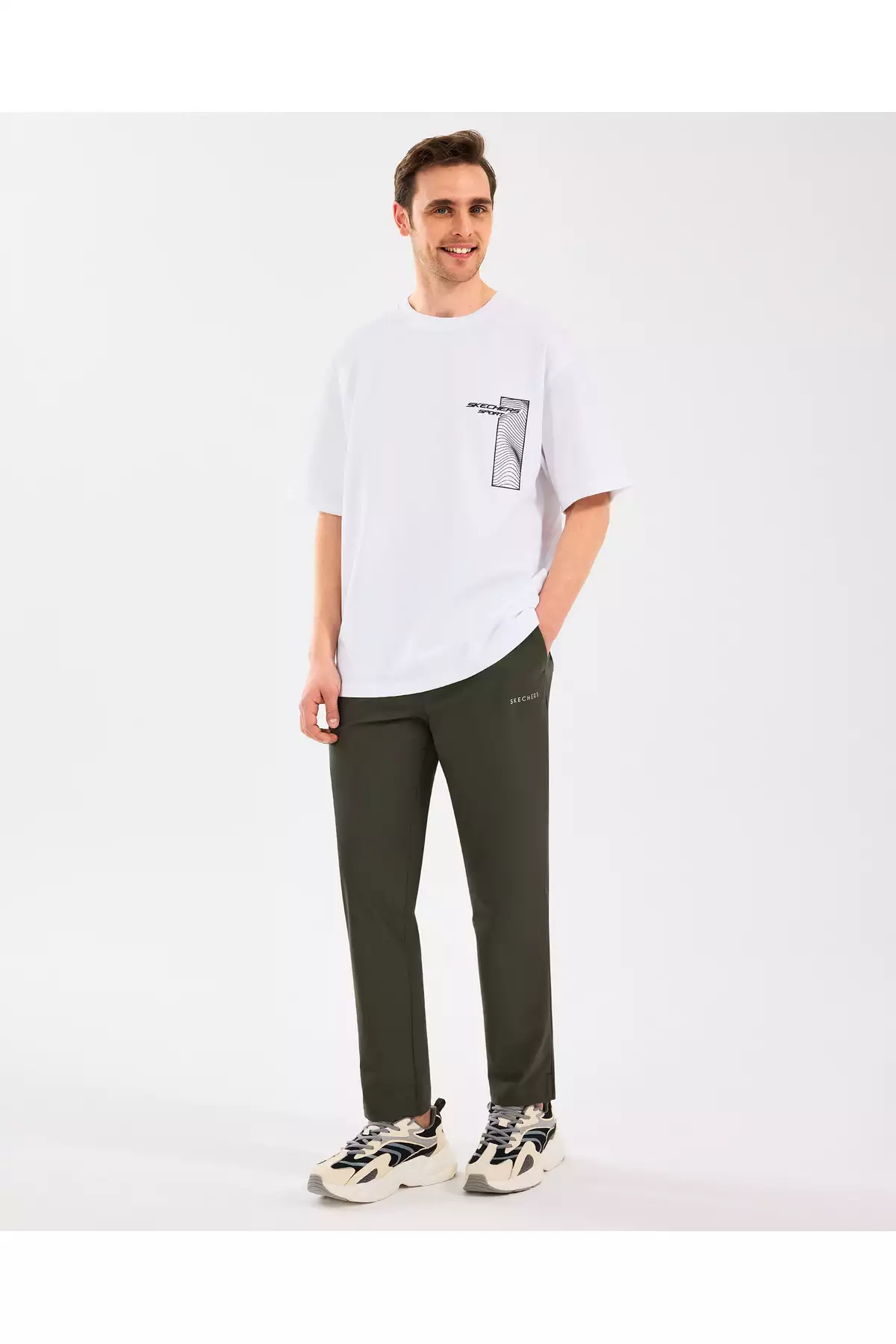 شلوار مردانه میکرو اسلیم سبز برند Skechers - 921298910
