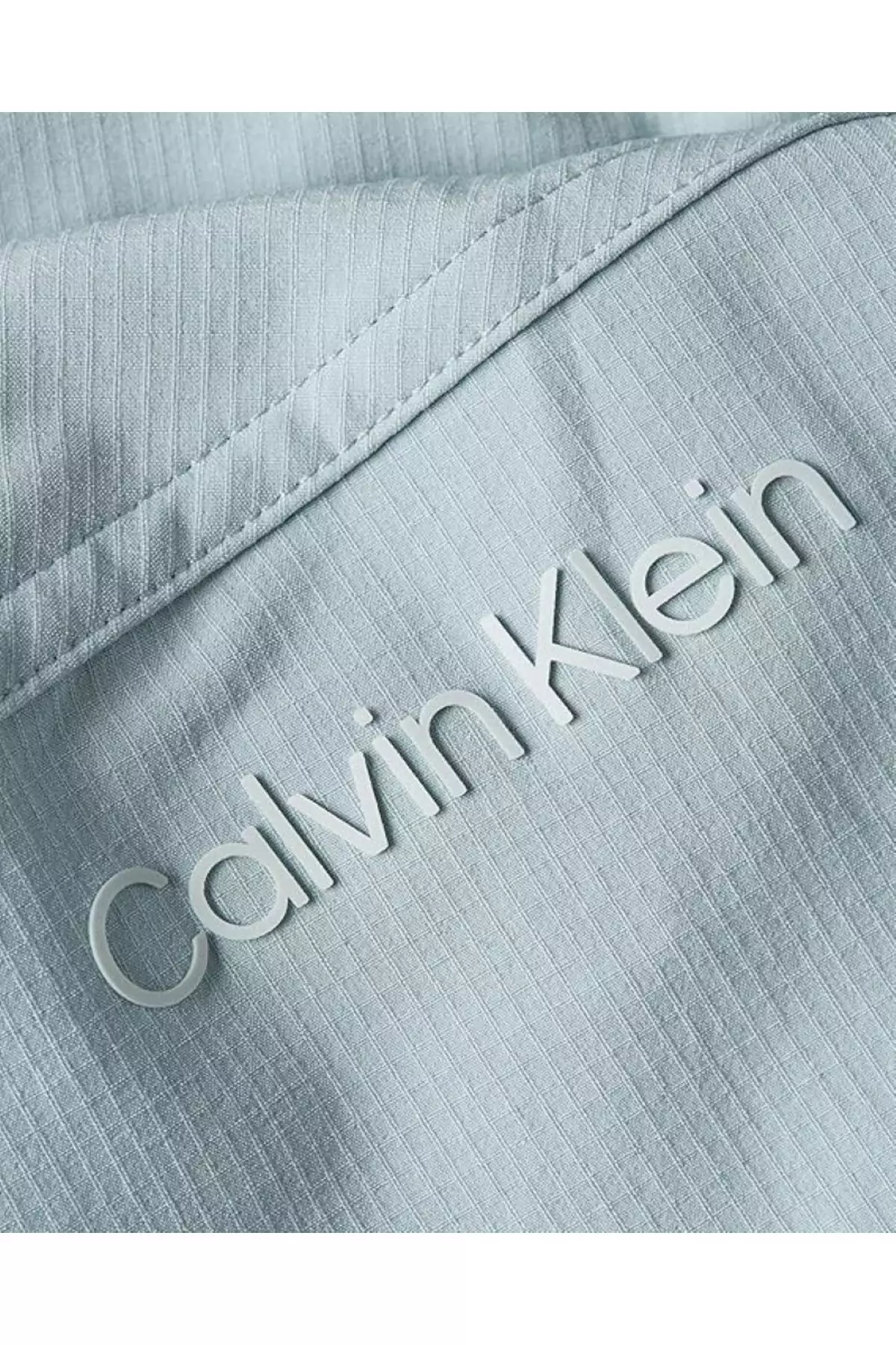 پوشاک بارانی زنانه با زیپ 1/4 - مدل PW برند Calvin Klein - 942588027