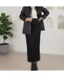 کاپشن چرم مشکی با جزئیات بادگیر، دارای جیب، کمر بند و داخل پشمی برند gl00my - 992707834