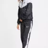 کاپشن زنانه هودی Windrunner مدل AR3092-010 برند Nike - 640616328
