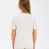 تیشرت گرافیکی بزرگ دخترانه رنگ کرم Off White مدل Sk2510122-102 برند Skechers - 928427859