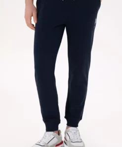 شلوار ورزشی مردانه با فیت اسلیم و دمپا کشباف رنگ سرمهای 50298047-VR033 برند U.S. Polo Assn. - 922054979