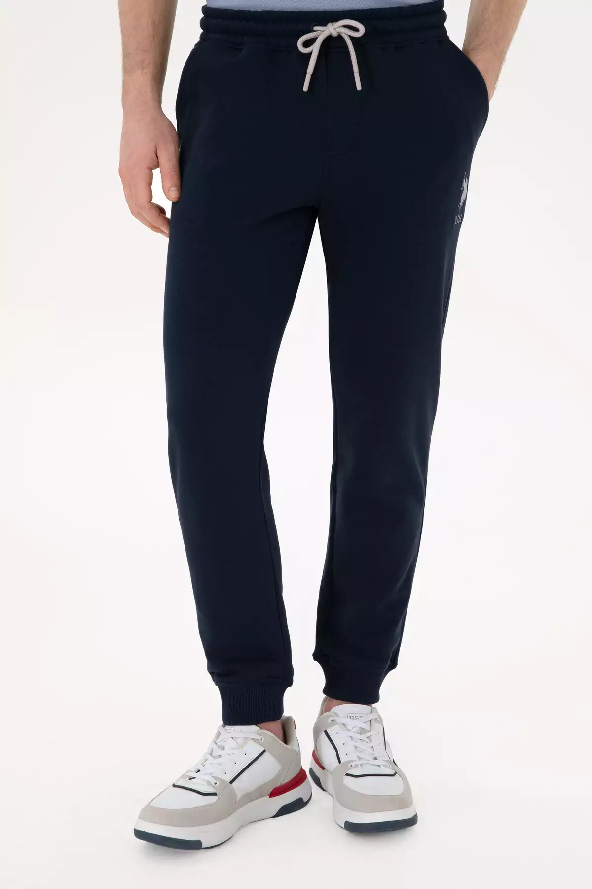 شلوار ورزشی مردانه با فیت اسلیم و دمپا کشباف رنگ سرمهای 50298047-VR033 برند U.S. Polo Assn. - 922054979