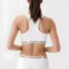 ست نیم تنه ورزشی و شورت زنانه - رنگ سفید، ست راحت و پنبهای برند U.S. Polo Assn. - 960104911