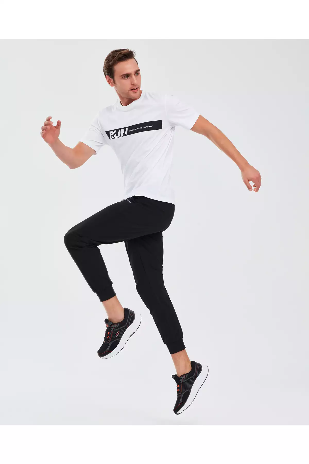 شلوار جوجینگ مردانه مایکرو کالکشن با زیپ کناری - مشکی S211809-001 برند Skechers - 98106288