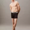 شورت مردانه راحت با پارچه کشی و شعار دار، سهتایی، رنگ مشکی برند Calvin Klein - 939001400