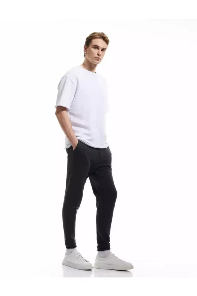 شلوار جگر با کمر بند دار و جیب‌های دکمه‌دار و دم‌پا کشباف برند Koton - 897395347