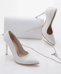 ست کیف و کفش زنانه با طراحی شیک، از جنس چرم مصنوعی و با کفی راحت، پاشنه 10 سانتیمتر و در رنگ مشکی سوئید. برند LULO - 784307733